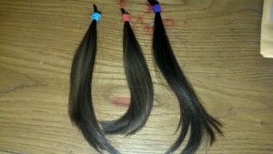 I saved three small ponytails - one for Mike and one for each of the boys.